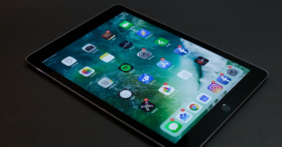 a sleek tablet with various multimedia and social media app icons on display